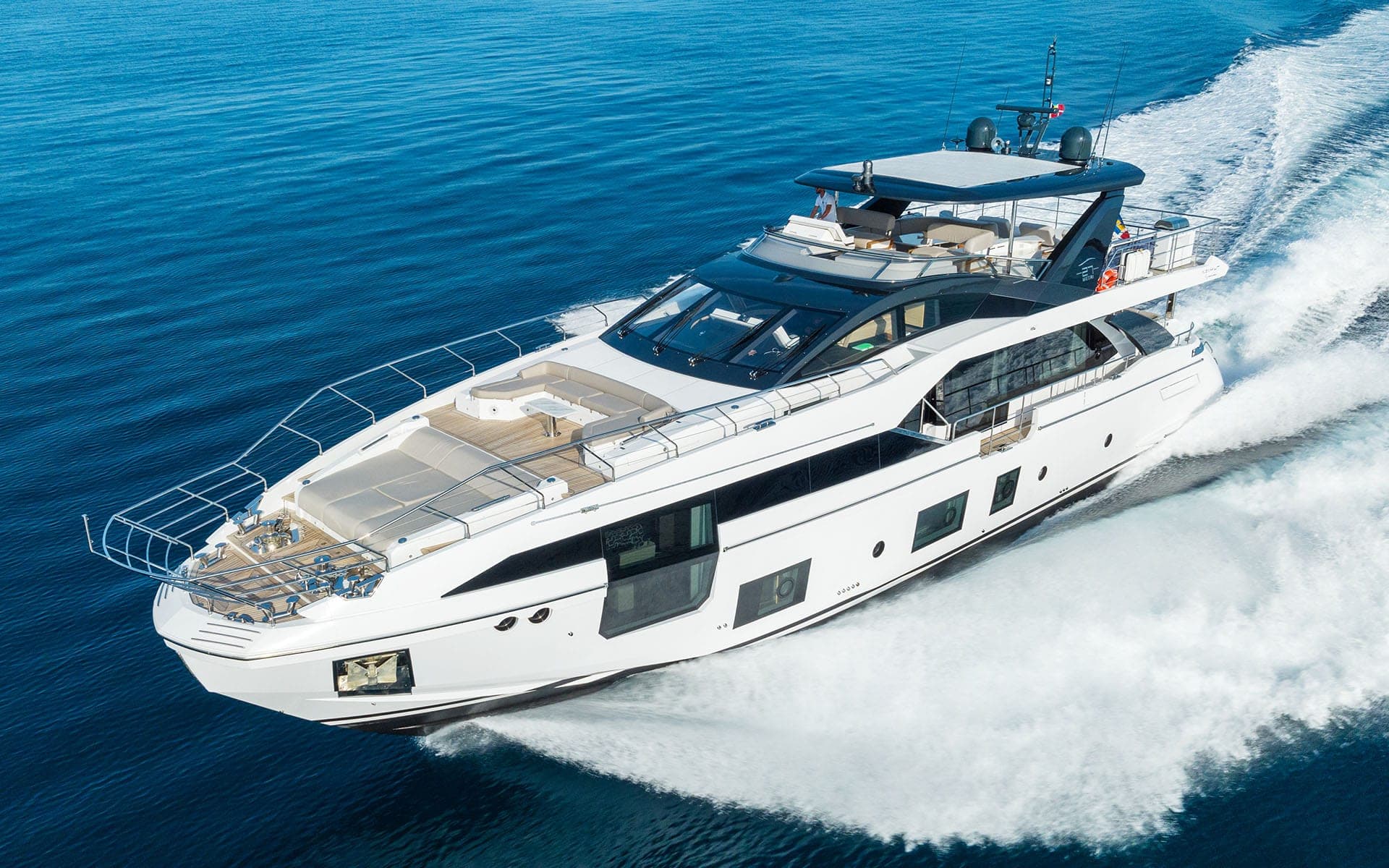 The 88' Azimut running at speed, Well Played Editions charter yacht in Miami