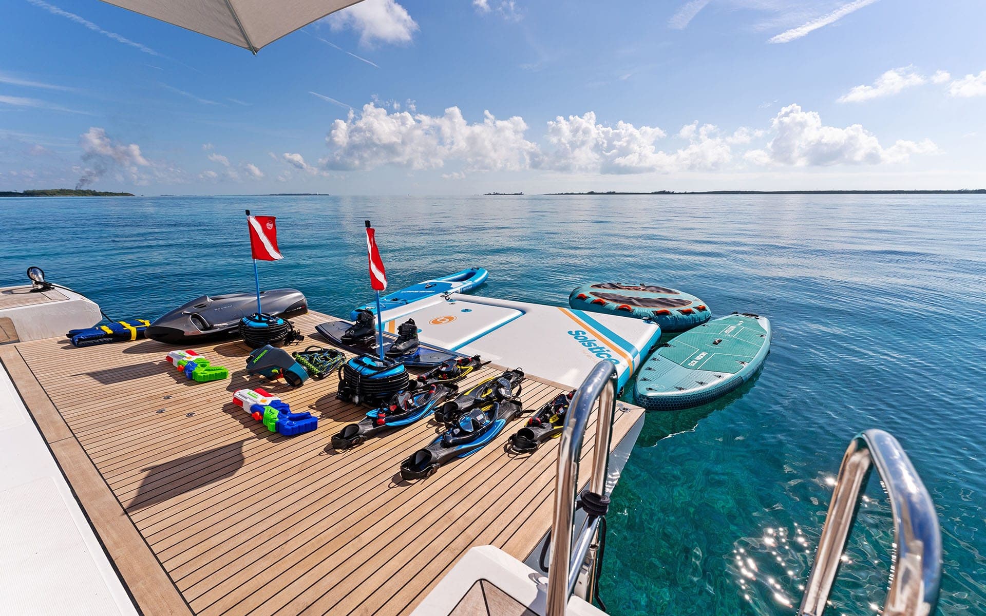 Water toys laid out on the deck of the 88' Azimut